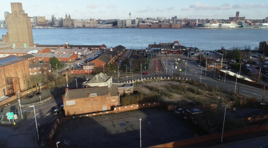 An ariel view of Woodside showing the roads leading up to the ferry terminal and the view across the river to Liverpool