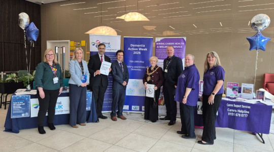 Wirral Council staff pose alongside Wirral Mayor and staff from Age UK and WIRED