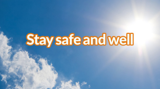 Blue sky with sun and text saying Stay Safe and Well