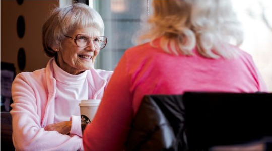 A stock image showing an older person receiving advice