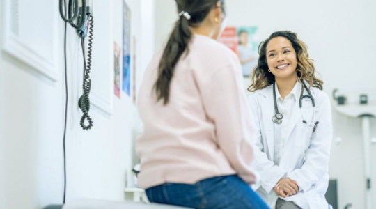 Doctor attending to patient