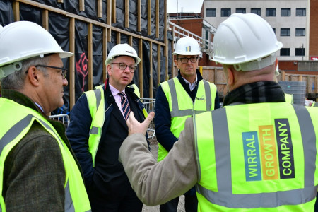 Michael Gove being shown WGC office site development getting underway in Birkenhead