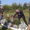 RHS judge inspects an In Bloom entry with members of Prenton Rugby club watching on