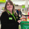 pic of asda colleague with basket of food