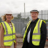 Leader of Wirral Council Cllr Paula Basnett stands with Steve Parry, Managing Director at ION Developments, on site at Hind Street in front of the former gasworks