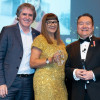 A picture of Mayor Steve Rotheram, Judge's Inspiration winner Karen Gallagher and host of the awards ceremony stood on stage at last year's event, with Karen holding her award