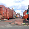 A photo showing the entrance to Bebington Road pedestrianised area from Boundary Road