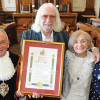 Charlie Landsborough pictured with the Freedom scroll with wife Thelma, and the Mayor and Mayoress of Wirral