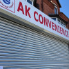 A photos showing the outside of AK Convenience