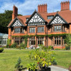 grand manor house in Noctorum, with gardens