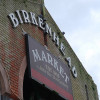 Birkenhead Market exterior showing market sign
