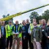 Magenta Living’s Paul McGrady alongside Cllr Paula Basnett, Leader of Wirral Council, and partners on site.
