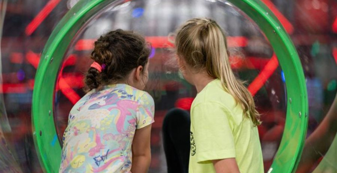 Two young girls at soft play 