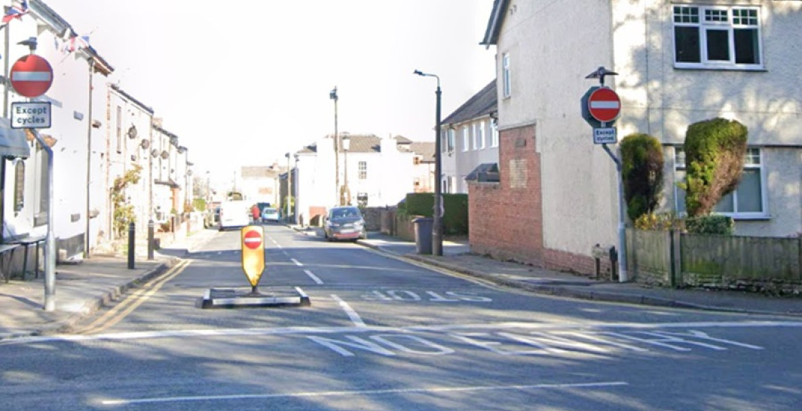 A photo showing the entrance to Village Road, Bebington from its junction with Mount Road