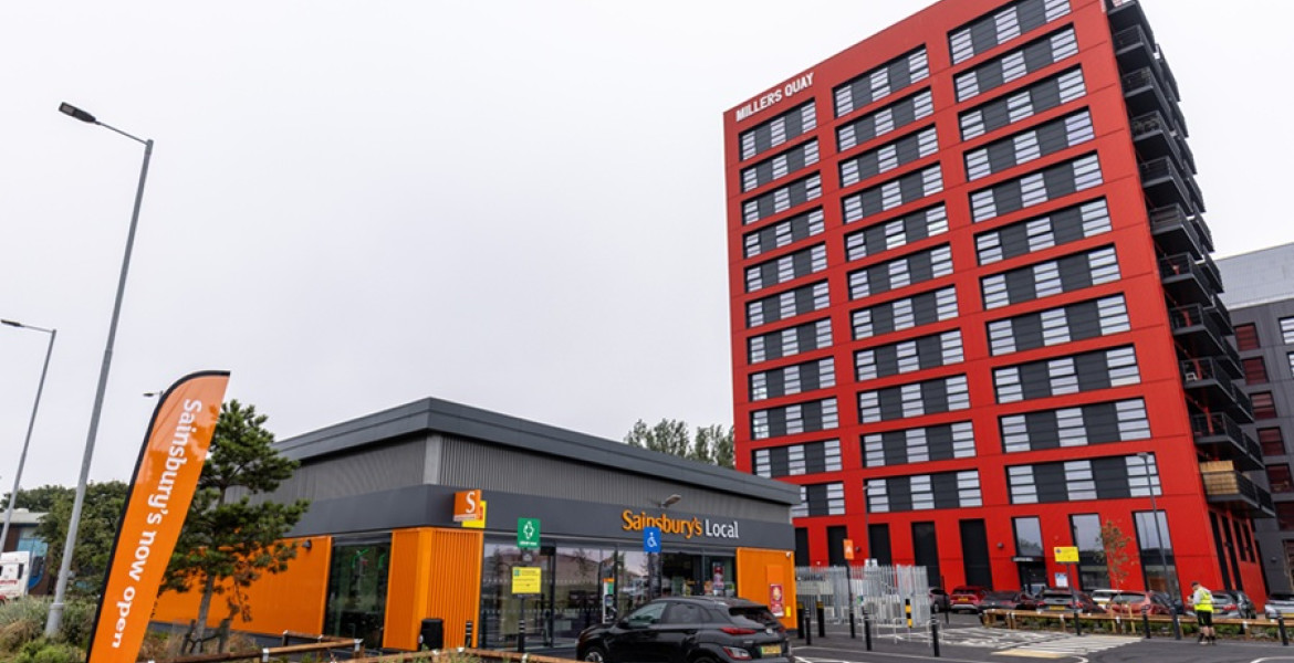 Sainsburys Local store at Wirral Waters with Millers Quay in the background