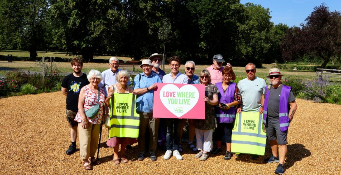 Cllr Max Booth pictured with volunteers from the Friends group at Mayer Park in Bebington