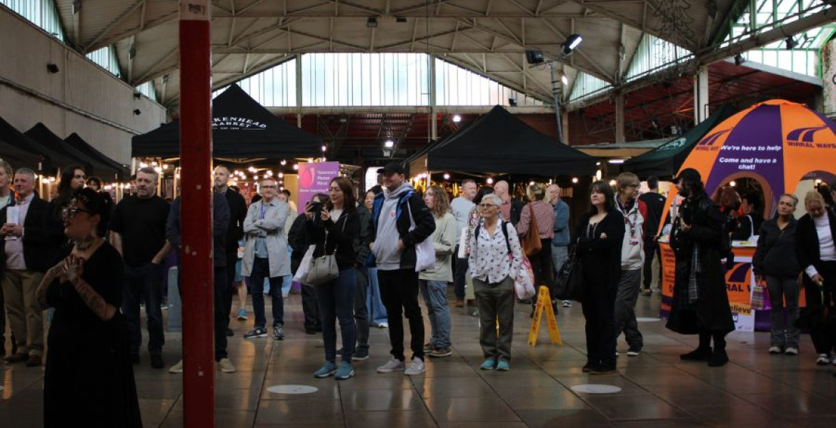 People attending Recovery Fest in Birkenhead Market