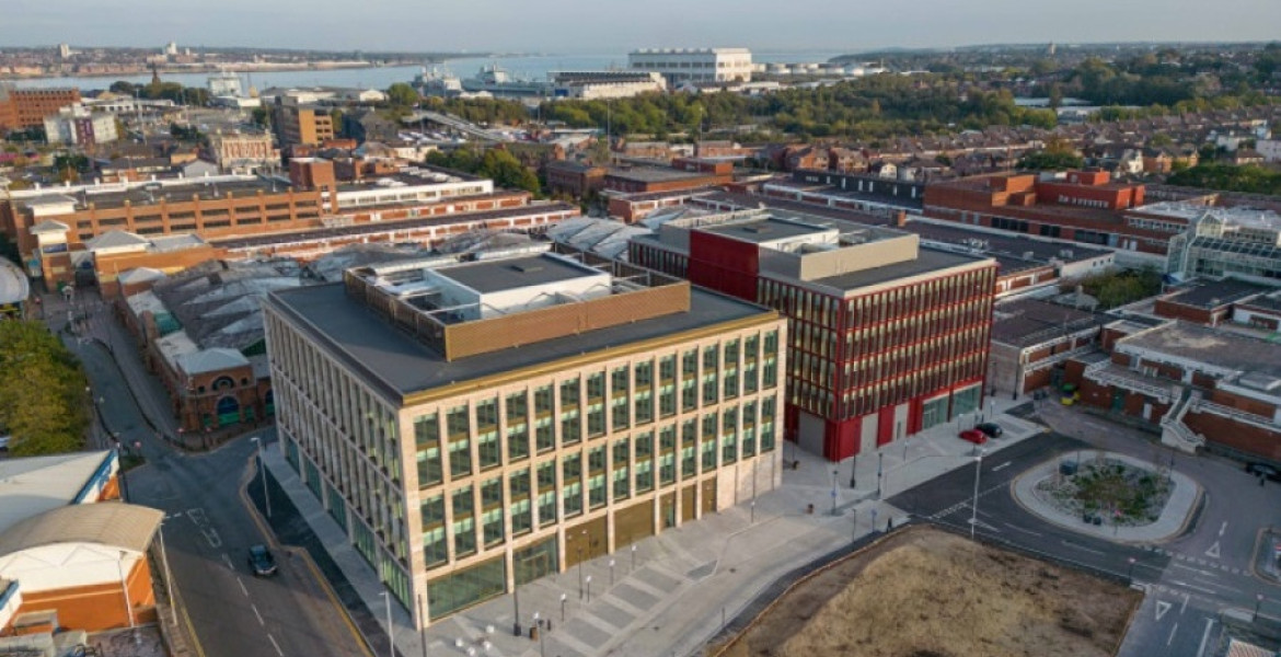 The council's flagship office buildings, Mallory and Irvine, shown from above with Birkenhead's waterfront in the background