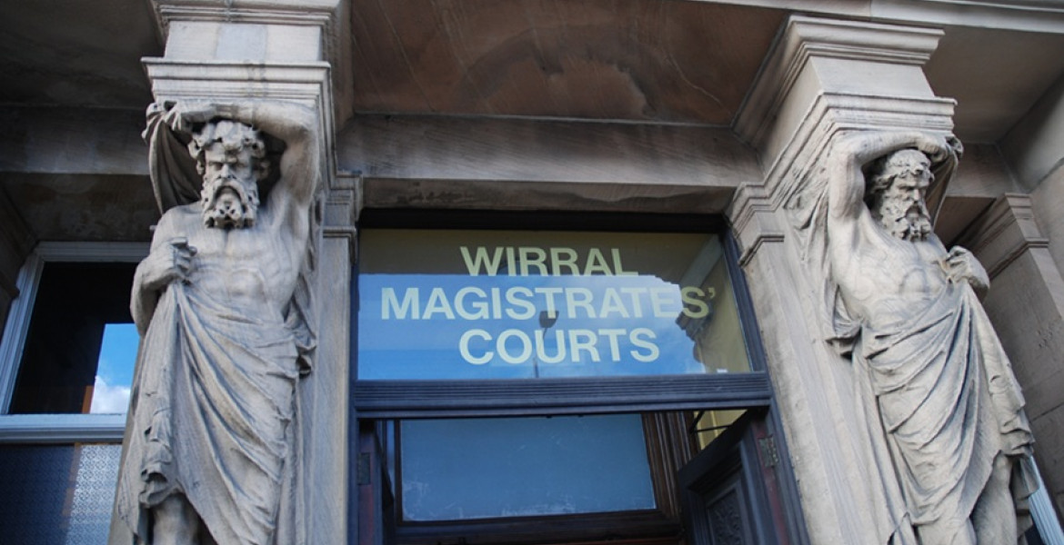 A stock image showing the sign above the door of Wirral Magistrates Court
