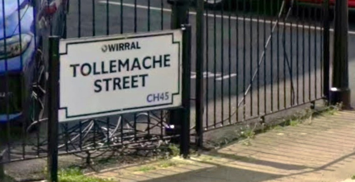A photo of the road sign at the entrance to Tollemache Street