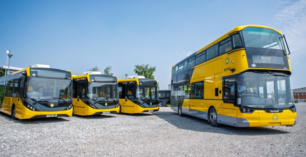 An image showing yellow buses parked up that are part of the new fleet