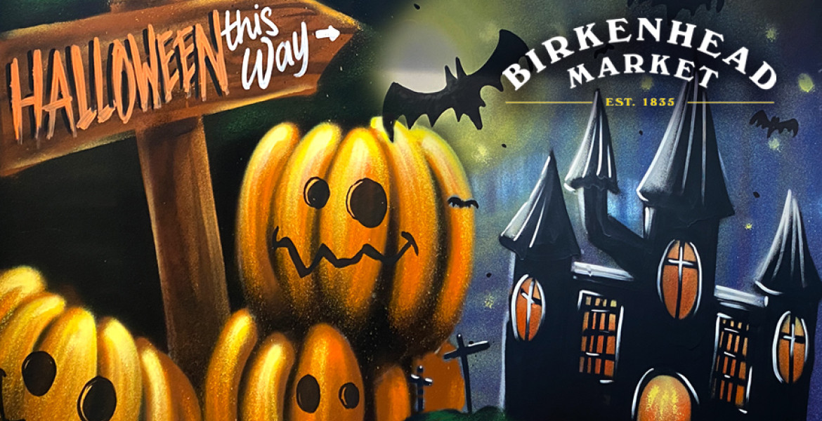 Halloween pumpkins with sign say "Halloween this way" and haunted castles in background