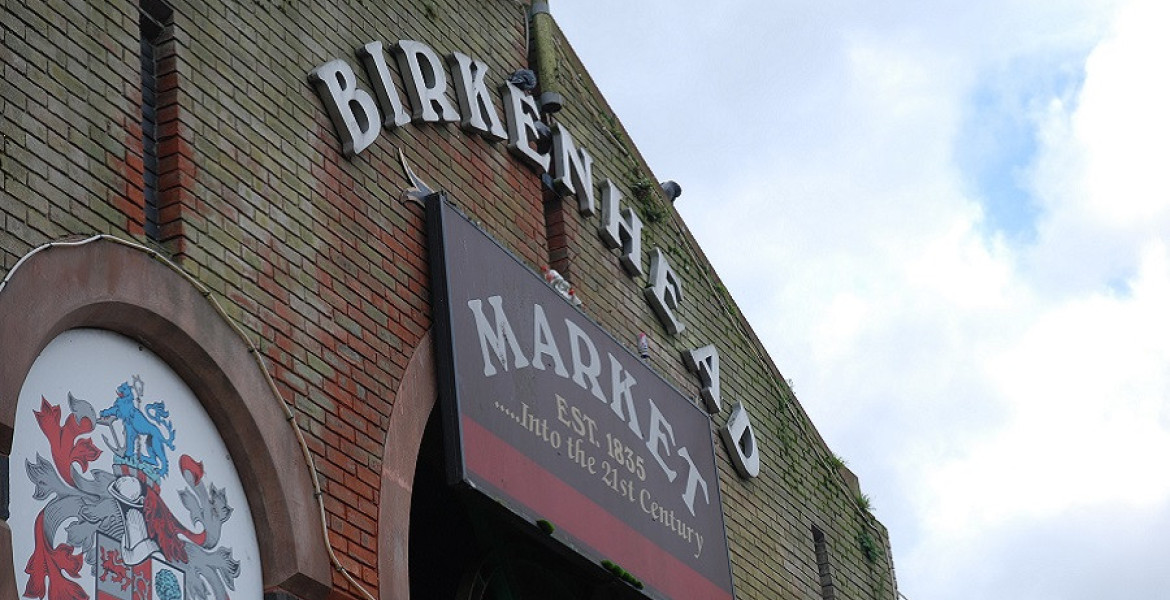 Birkenhead Market exterior showing market sign
