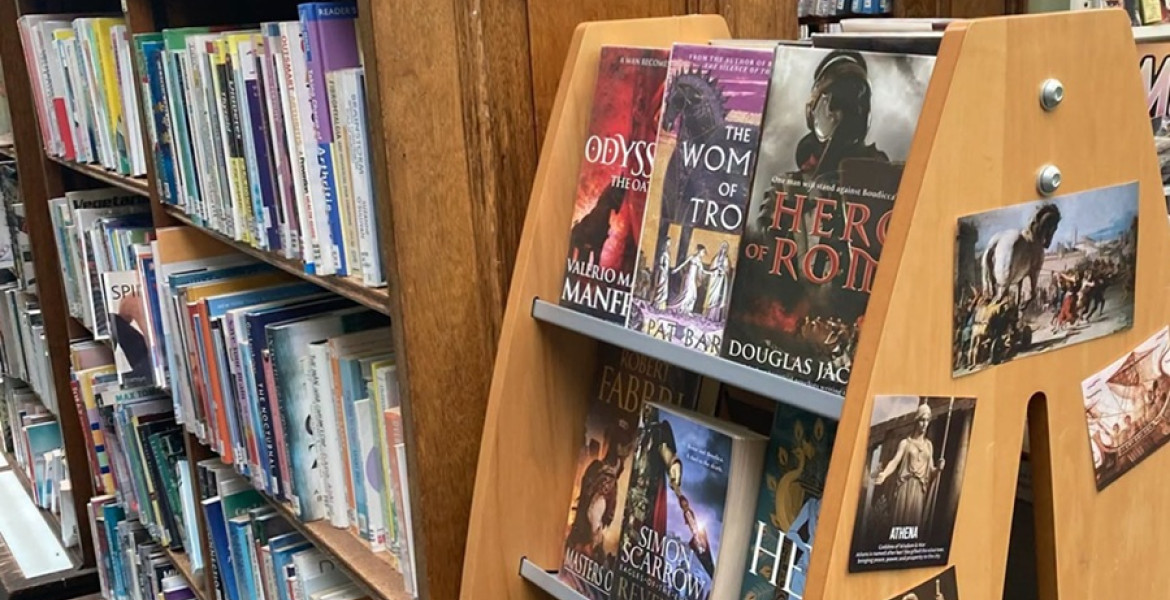 An image from a Wirral library showing books on display and on a shelf